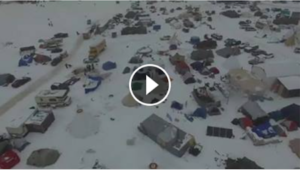View of the camp after the blizzard. Our tent is the green one at the 2:25 mark, in the lower left hand corner. Facebook Live Video by Myron Dewey / Indigenous Rising Media.
